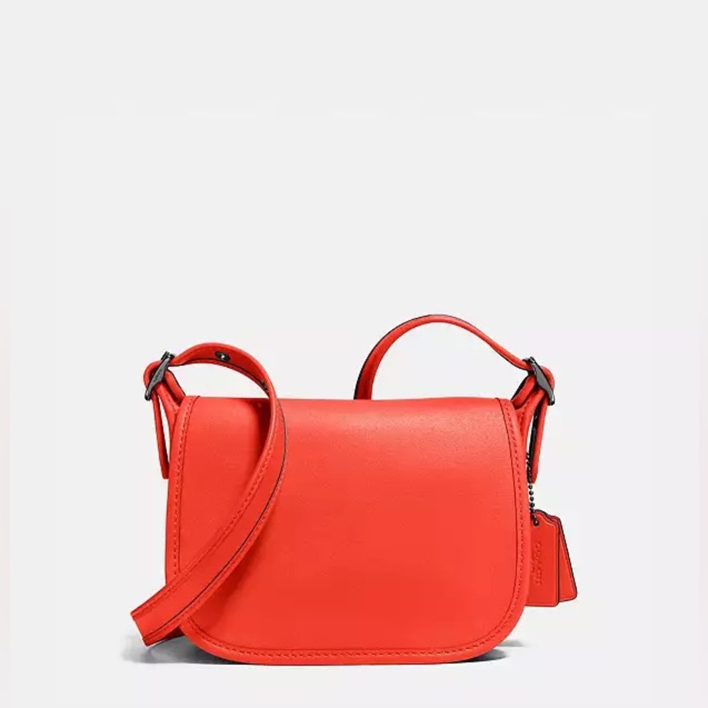 Beautiful Coach purse in coral orange